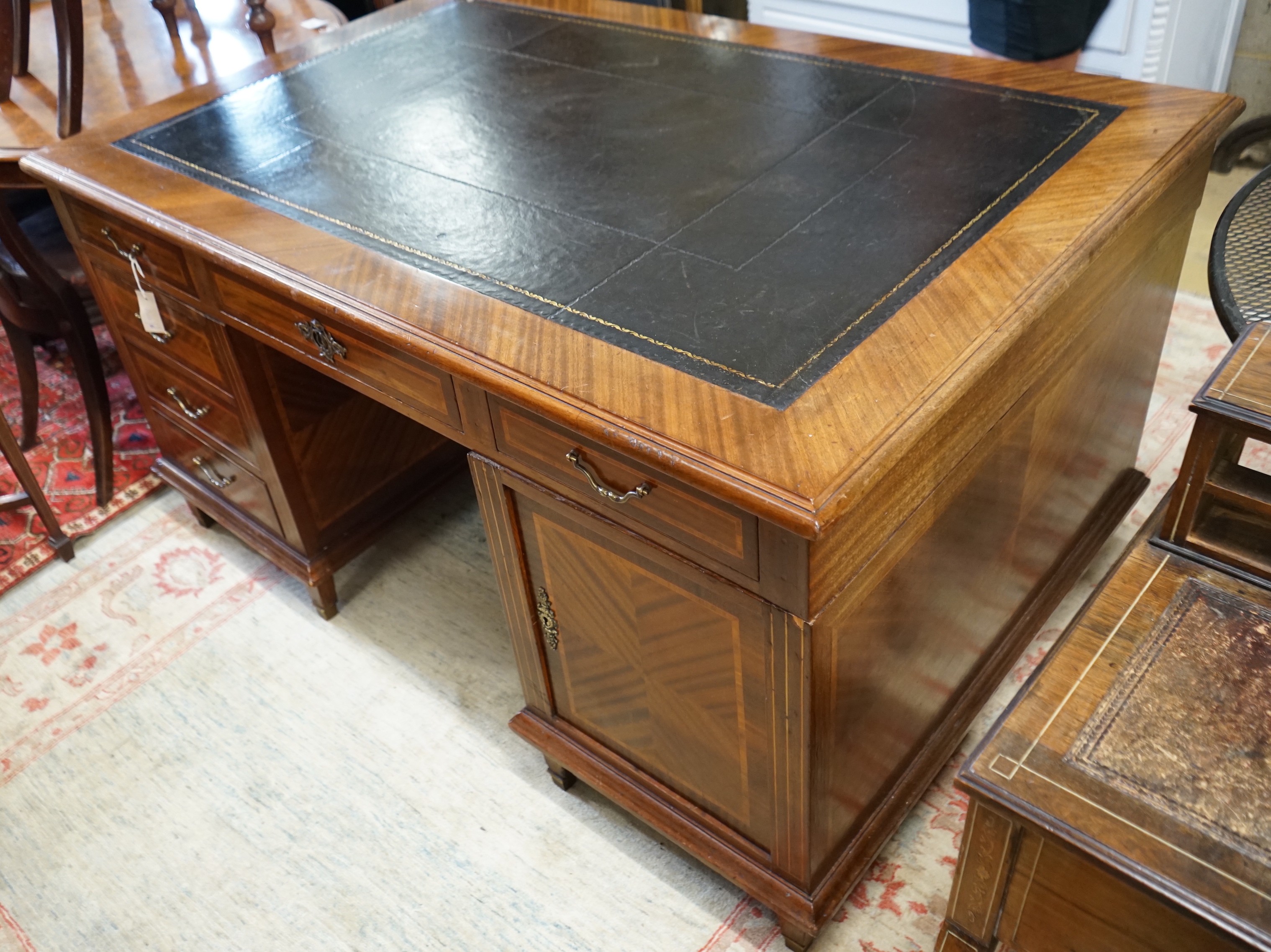 A mid 20th century French satinwood banded mahogany pedestal partner's desk, length 150cm, depth 98cm, height 79cm